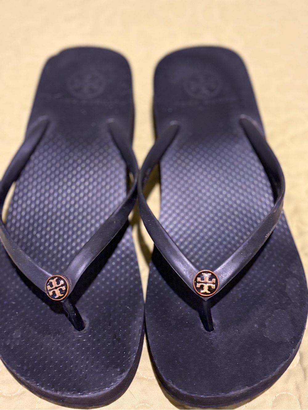 Tory Burch Black Flip Flop Sandals with Gold Logo Medallion